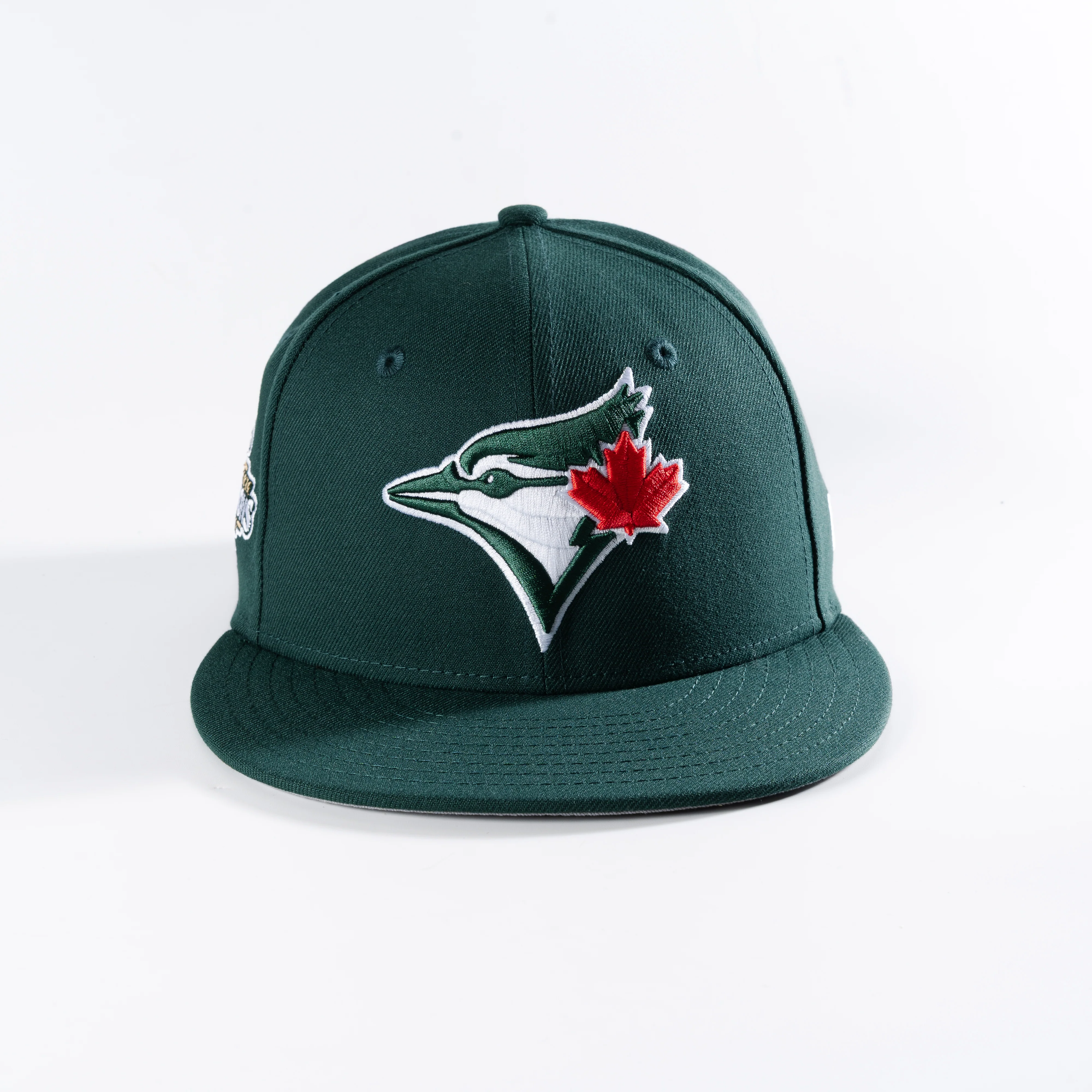 TORONTO BLUE JAYS 2025 AMERICAN LEAGUE CHAMPIONS DARK GREEN 59FIFTY FITTED HAT - Image 2