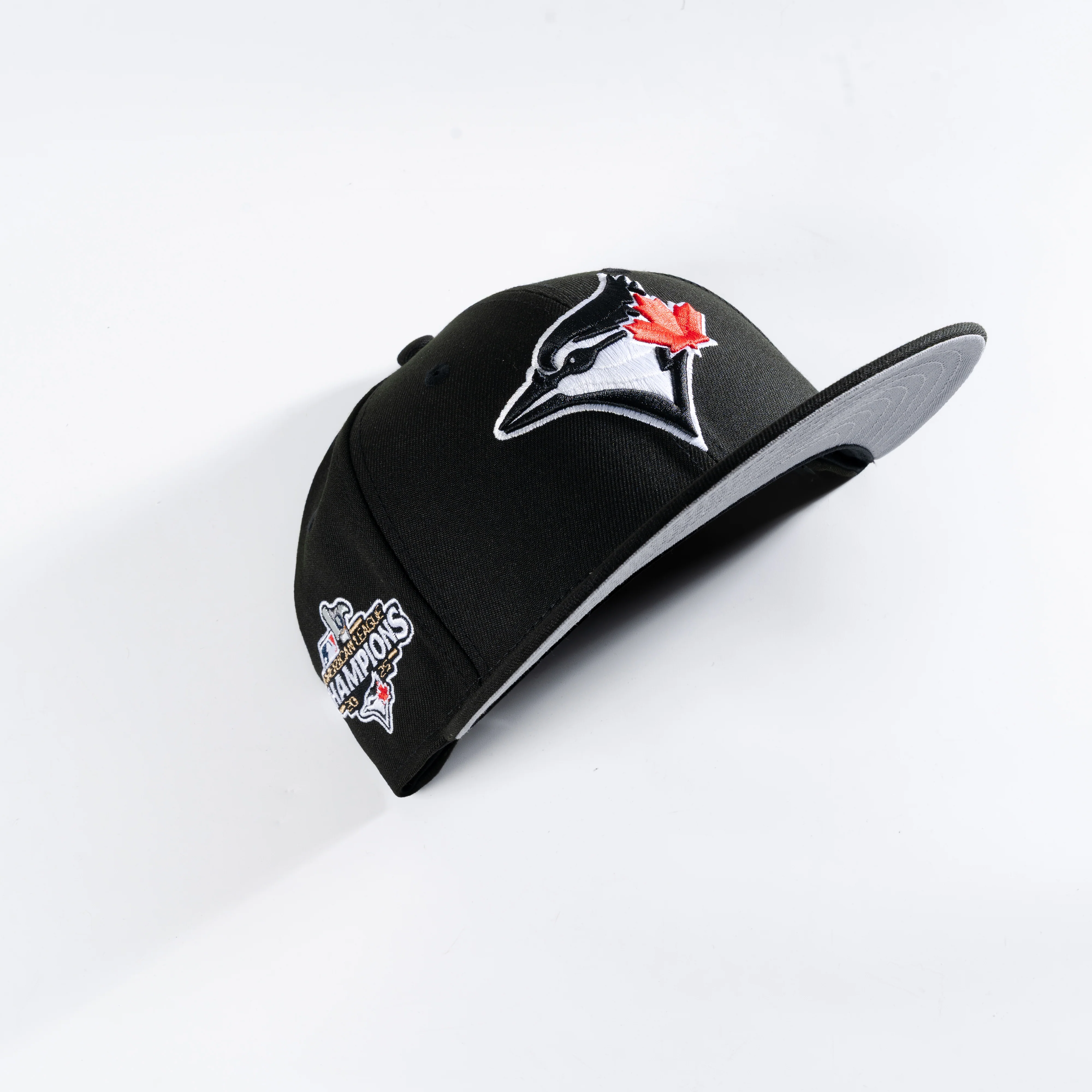 TORONTO BLUE JAYS 2025 AMERICAN LEAGUE CHAMPIONS JET BLACK 59FIFTY FITTED HAT